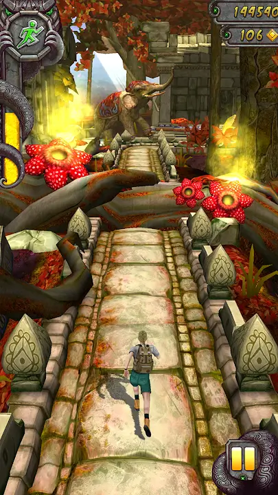 Temple Run 2 character dodging obstacles like fire traps and gaps.